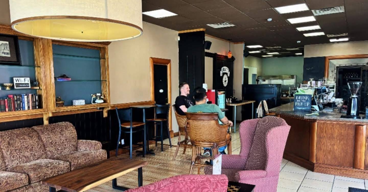 The Vault 223 interior with lounge seating and coffee counter